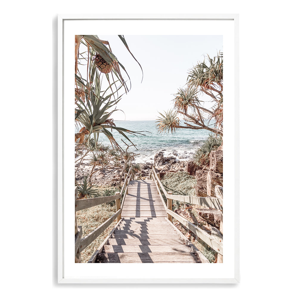 An artwork of the stunning blues of the sea and muted tones of the sand with a view as you take the stairs to the beach in Queensland Australia. 