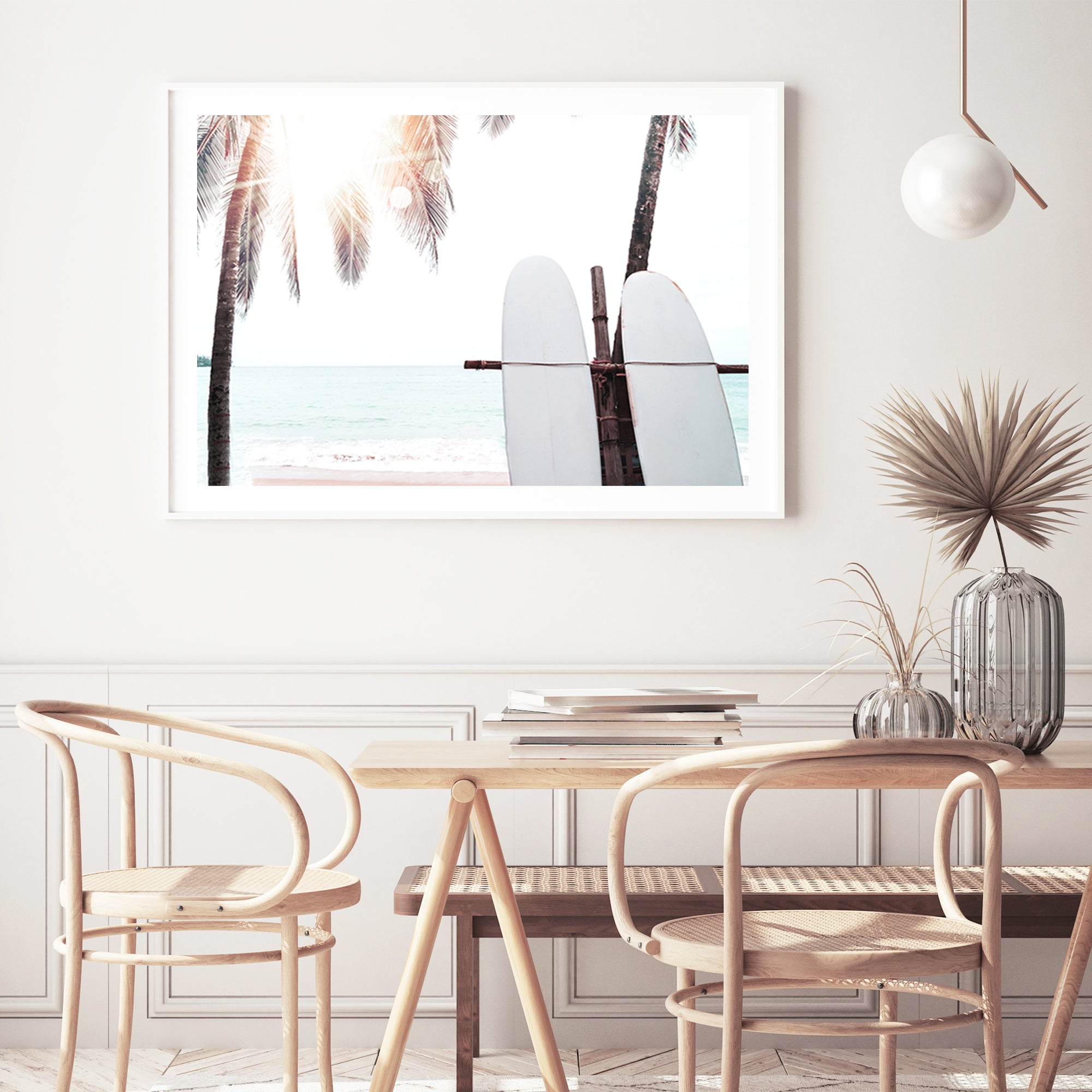 A photographic artwork of two white surf boards under the palm trees with a tropical sunset available in canvas and art print.