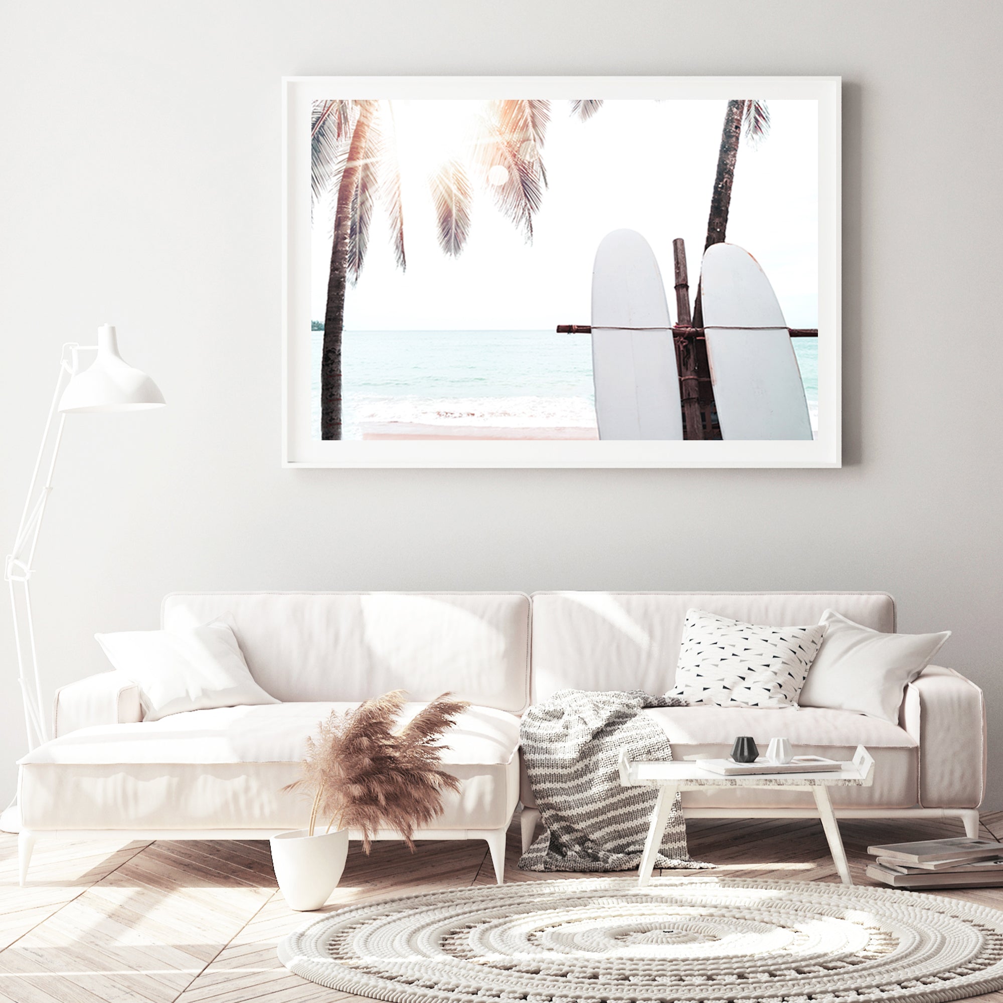 A photographic wall art of two white surf boards under the palm trees with a tropical sunset available in canvas and art print.