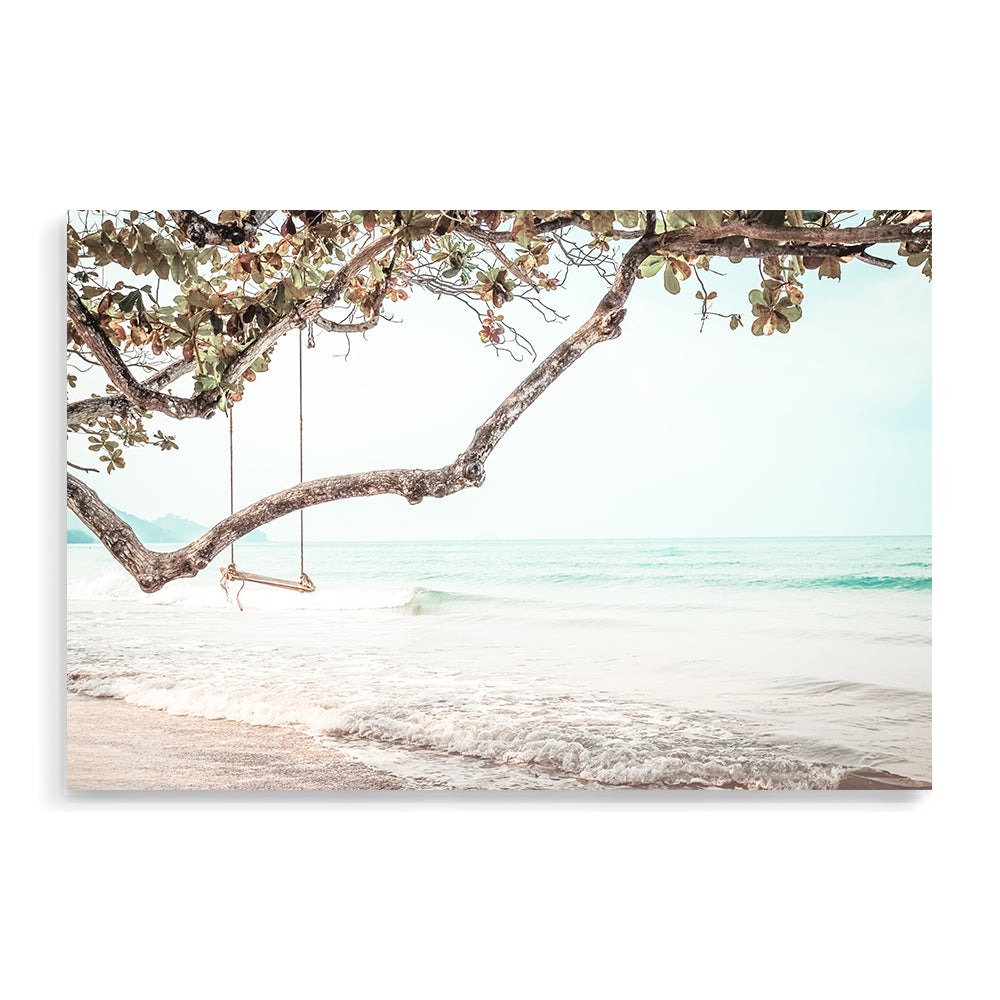 An artwork of a beachside swing with a beautiful view. This wall art print is available framed or unframed.