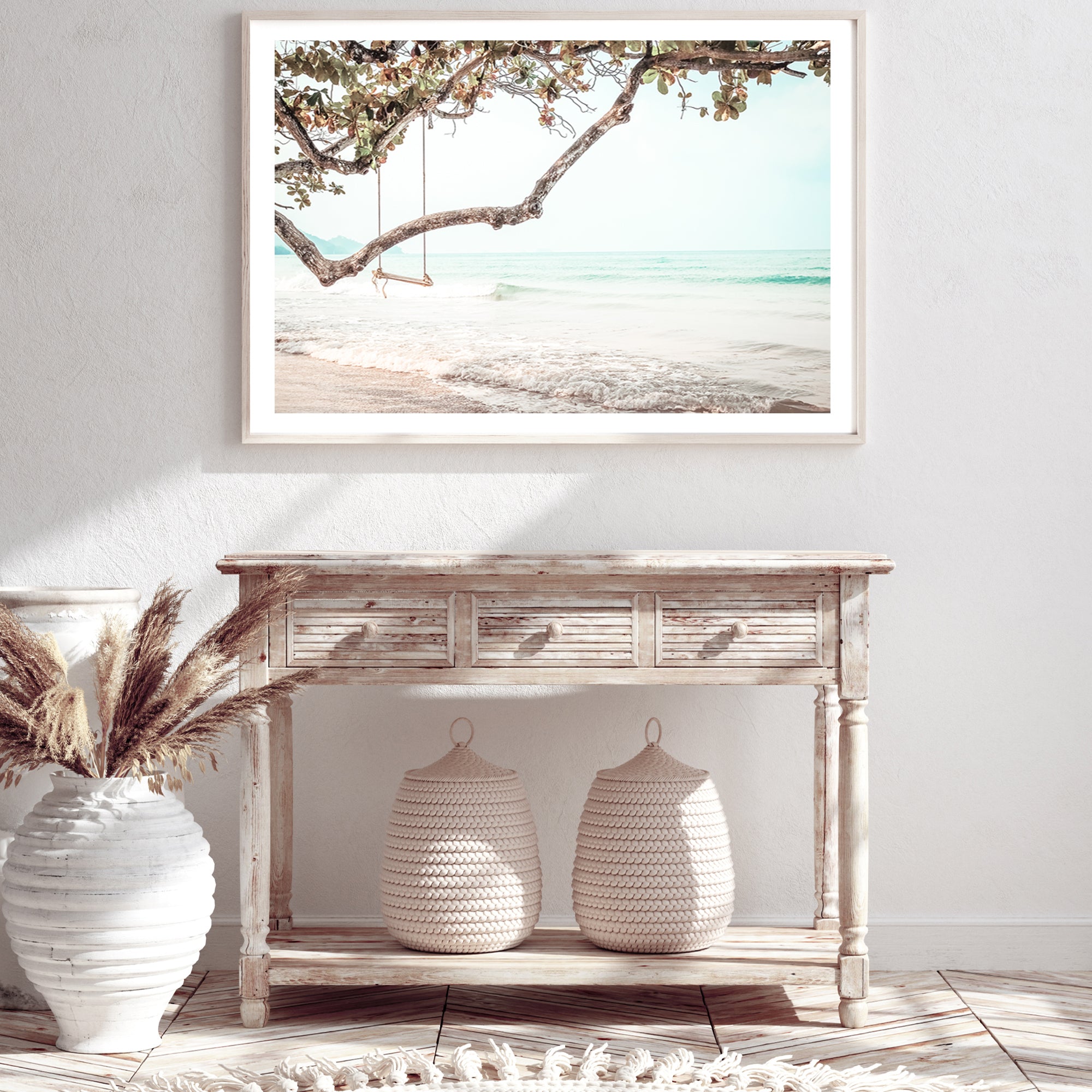 A photo wall art print of a beachside swing, available in print and canvas.