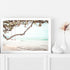 An artwork of a swing in the trees along a beautiful beach, available framed or unframed, canvas and print artwork.