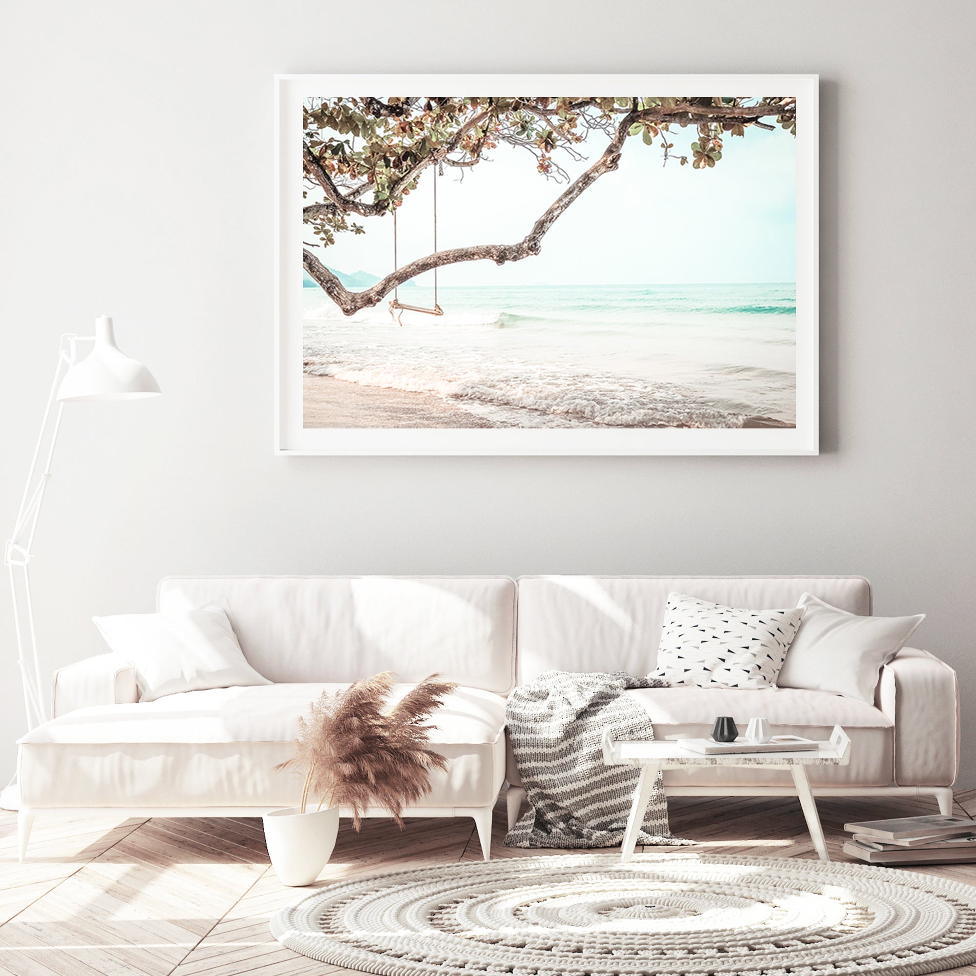 A wall art of a swing in the trees along a beautiful beach, available framed or unframed canvas and print artwork.